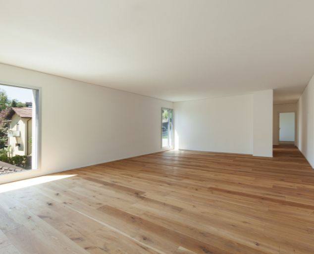 Piso laminado com textura amadeirada em quarto aconchegante